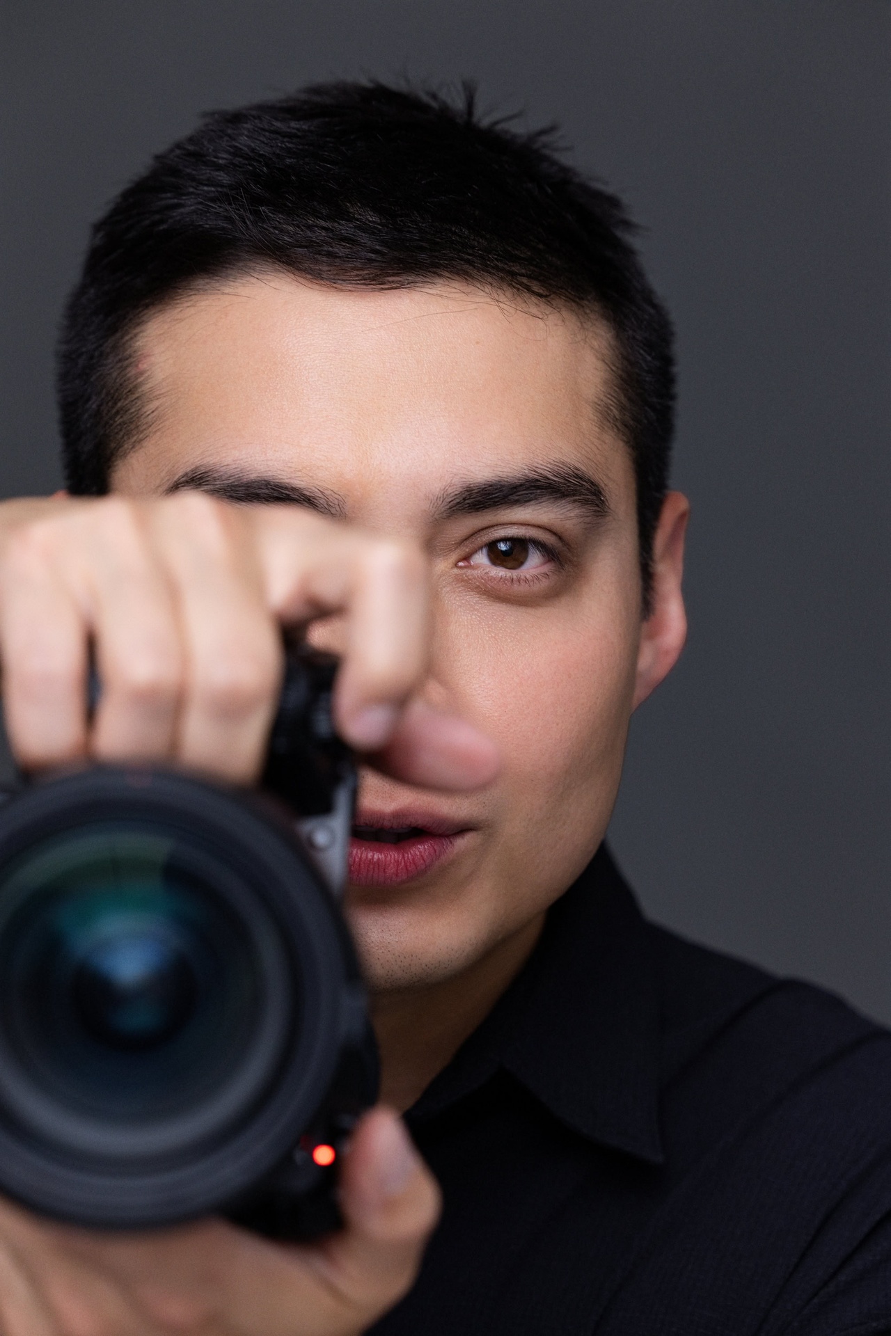 Photographer behind lens